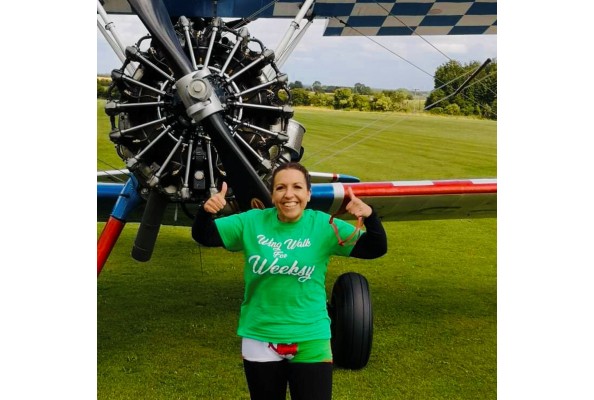 ali wing walk infront of aircraft